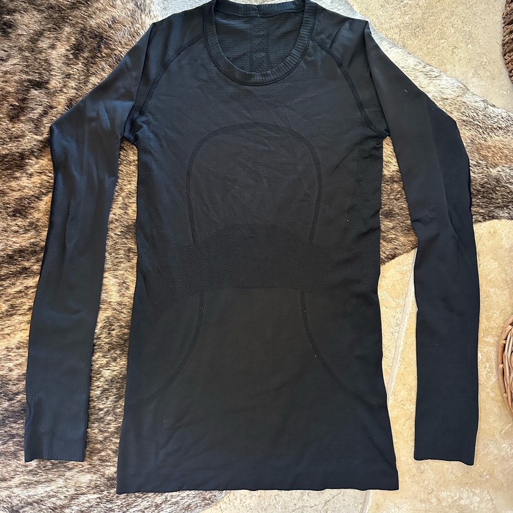 Lululemon Swiftly Tech black size 4
